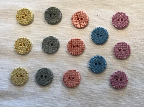 Reliefknapp i återvunnet material